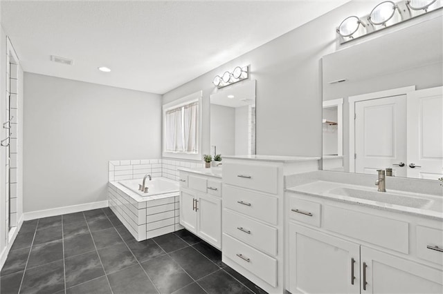 7295 NW Forest Lakes Dr, Parkville, MO 64152 - bathroom with vanity, a garden tub, recessed lighting, and tile patterned flooring