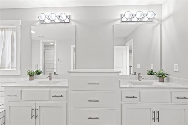 7295 NW Forest Lakes Dr, Parkville, MO 64152 - bathroom featuring two vanities and tiled shower