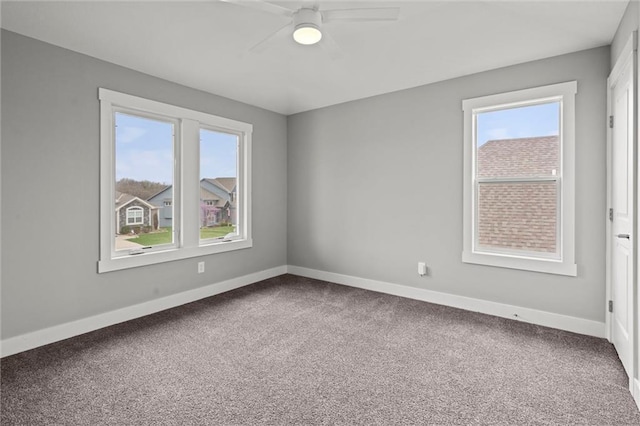 7295 NW Forest Lakes Dr, Parkville, MO 64152 - carpeted empty room with healthy amount of natural light and ceiling fan