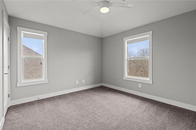 7295 NW Forest Lakes Dr, Parkville, MO 64152 - carpeted empty room with plenty of natural light and a ceiling fan
