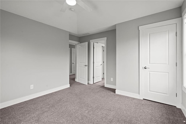 7295 NW Forest Lakes Dr, Parkville, MO 64152 - unfurnished bedroom with carpet floors and a ceiling fan