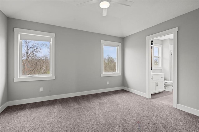 7295 NW Forest Lakes Dr, Parkville, MO 64152 - unfurnished room featuring carpet floors, plenty of natural light, and ceiling fan