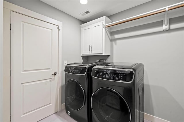 7295 NW Forest Lakes Dr, Parkville, MO 64152 - washroom with cabinet space and independent washer and dryer