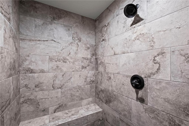 room details with a tile shower