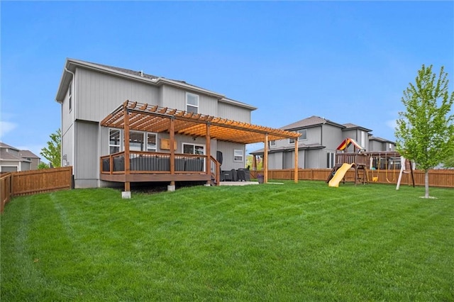 rear view of house featuring a lawn, a fenced backyard, a playground, and a pergola