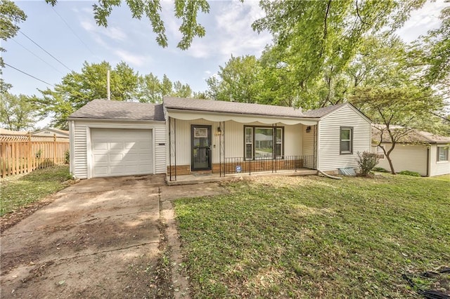 10408 E 28th Ter S, Independence, MO 64052 - ranch-style home with covered porch, an attached garage, driveway, and a shingled roof