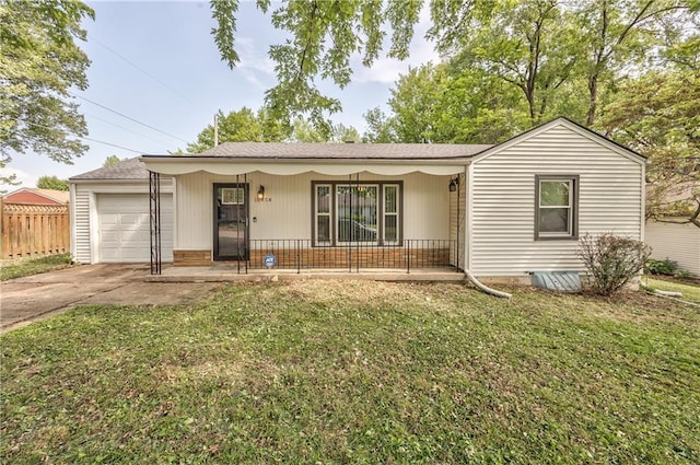 10408 E 28th Ter S, Independence, MO 64052 - single story home with a porch, a garage, and driveway