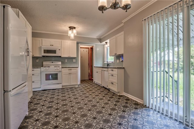 10408 E 28th Ter S, Independence, MO 64052 - kitchen with white appliances, a chandelier, crown molding, white cabinetry, and tasteful backsplash