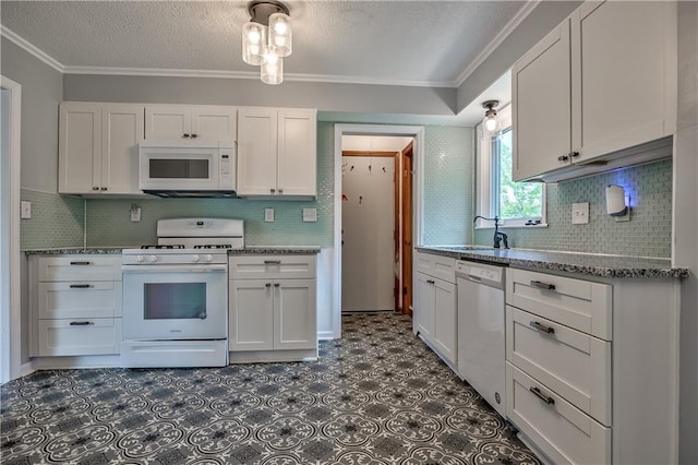 10408 E 28th Ter S, Independence, MO 64052 - kitchen featuring white appliances, white cabinets, decorative backsplash, a textured ceiling, and ornamental molding