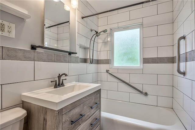 10408 E 28th Ter S, Independence, MO 64052 - bathroom with toilet, tile walls, vanity, and shower / bath combination