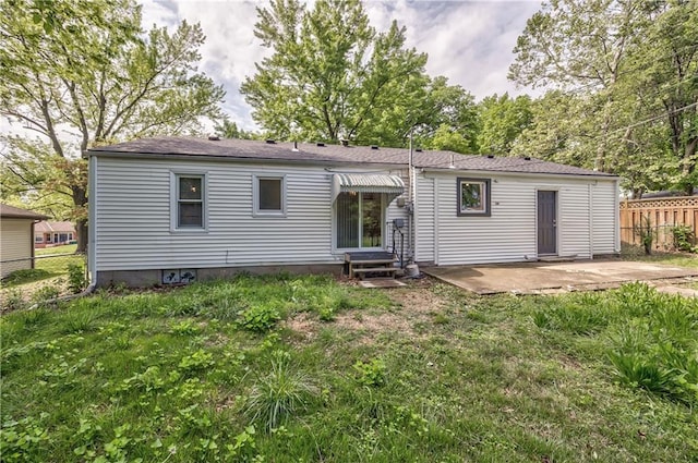 10408 E 28th Ter S, Independence, MO 64052 - rear view of property with fence, entry steps, and a patio area