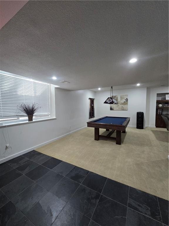 recreation room featuring tile patterned floors, a textured ceiling, billiards, recessed lighting, and carpet