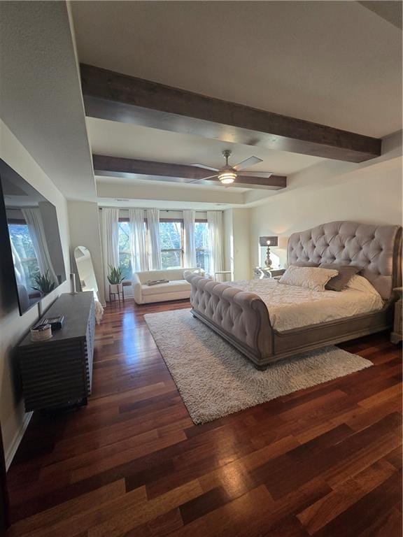 bedroom with dark wood-style floors, ceiling fan, and beam ceiling