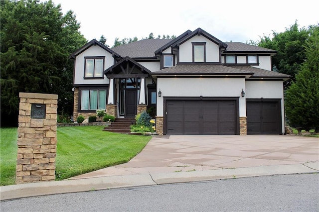 6822 Woodstock Ct, Shawnee, KS 66218 - view of front of house featuring stucco siding, a front yard, concrete driveway, and stone siding