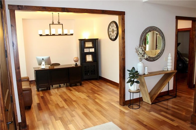 6822 Woodstock Ct, Shawnee, KS 66218 - hallway with light wood-style floors and baseboards