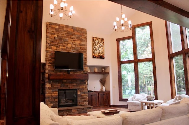 6822 Woodstock Ct, Shawnee, KS 66218 - living area with a chandelier, high vaulted ceiling, a fireplace, and wood finished floors