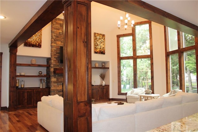 6822 Woodstock Ct, Shawnee, KS 66218 - living room with a chandelier, wood finished floors, and plenty of natural light