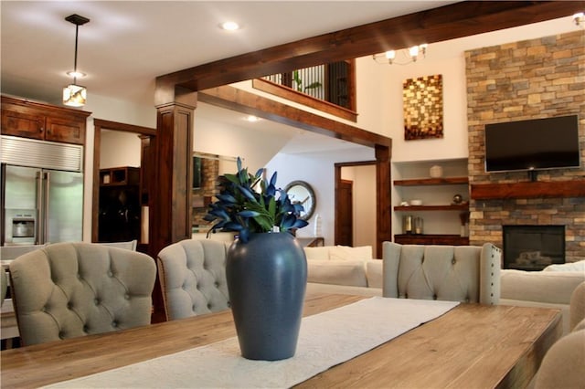 6822 Woodstock Ct, Shawnee, KS 66218 - living area featuring a stone fireplace and recessed lighting