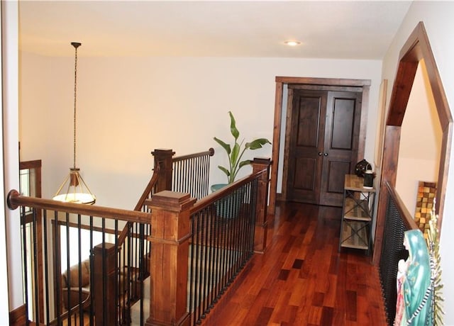6822 Woodstock Ct, Shawnee, KS 66218 - hall with dark wood-style flooring, an upstairs landing, and recessed lighting
