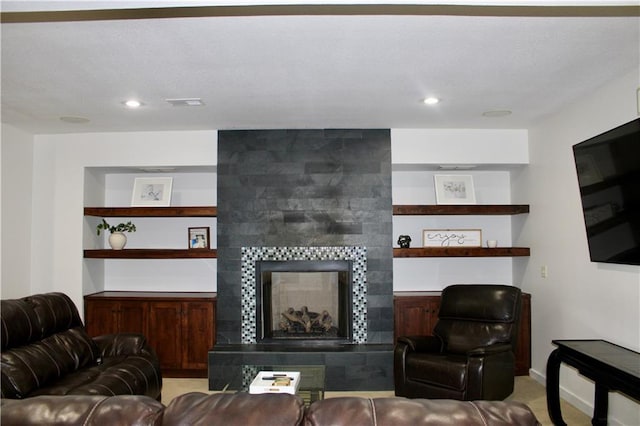 6822 Woodstock Ct, Shawnee, KS 66218 - living room with a tiled fireplace, recessed lighting, and carpet flooring