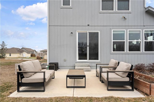 back of house featuring an outdoor hangout area and a patio area