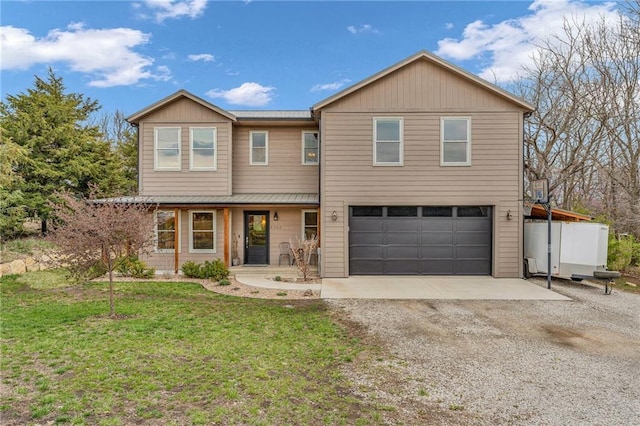 4866 Dabinawa Dr, Mclouth, KS 66054 - view of front of home featuring gravel driveway, a garage, and a front lawn