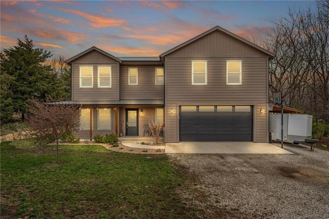 4866 Dabinawa Dr, Mclouth, KS 66054 - traditional-style house featuring a front lawn, driveway, and an attached garage
