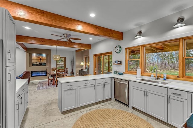 4866 Dabinawa Dr, Mclouth, KS 66054 - kitchen featuring stainless steel dishwasher, gray cabinets, a sink, and a peninsula