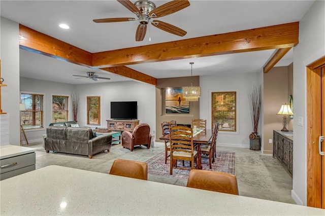 4866 Dabinawa Dr, Mclouth, KS 66054 - living area featuring recessed lighting, beam ceiling, baseboards, and ceiling fan
