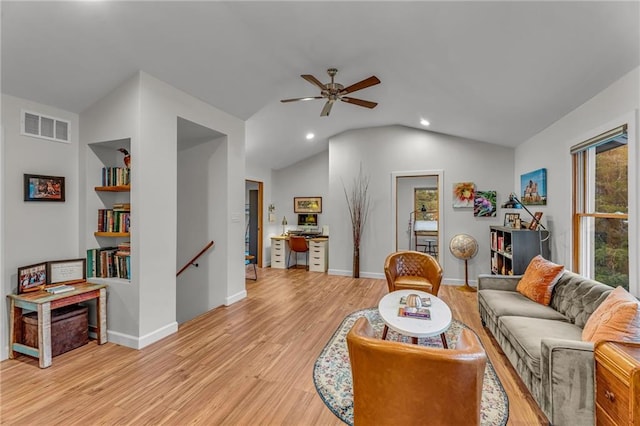 4866 Dabinawa Dr, Mclouth, KS 66054 - living area featuring lofted ceiling, recessed lighting, light wood finished floors, ceiling fan, and visible vents