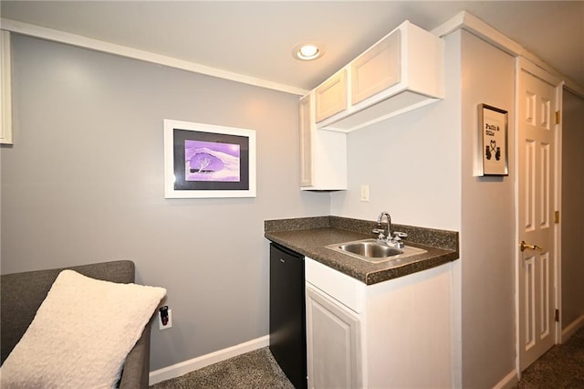 501 W 86th St, Kansas City, MO 64114 - kitchen featuring dishwasher, dark carpet, dark countertops, white cabinetry, and recessed lighting