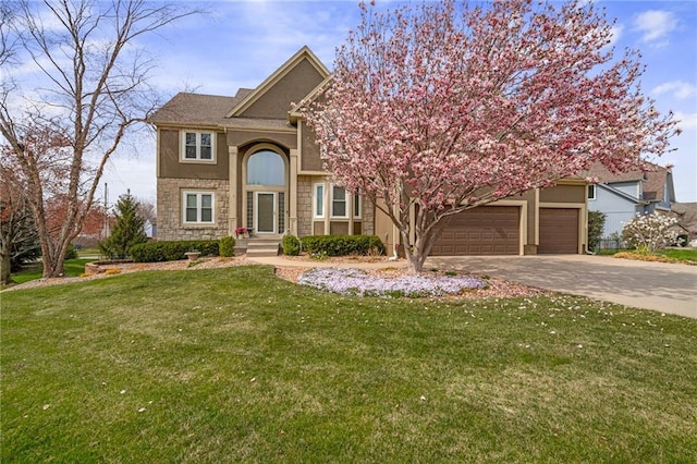 view of front of house with stone siding, stucco siding, driveway, a front lawn, and a garage