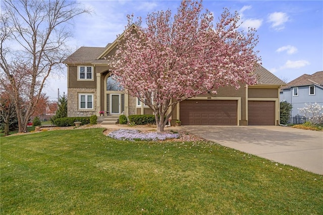 view of front of property with concrete driveway, stone siding, an attached garage, a front lawn, and stucco siding