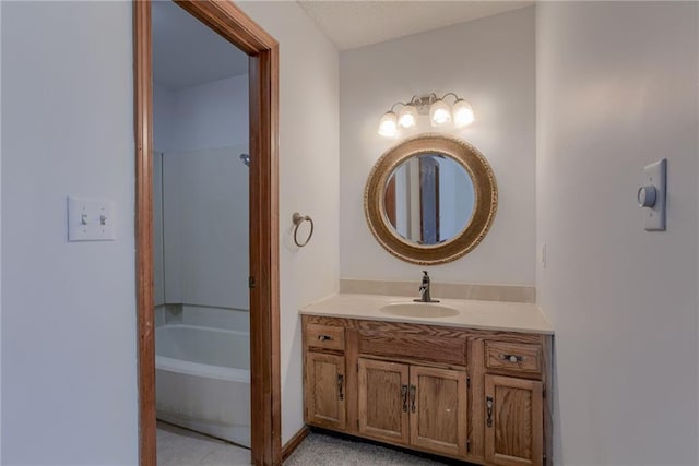 bathroom with washtub / shower combination and vanity