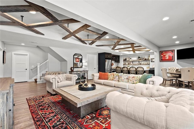 18050 N Peach Blossom Dr, Platte City, MO 64079 - living room with recessed lighting, stairs, beam ceiling, wood finished floors, and a bar