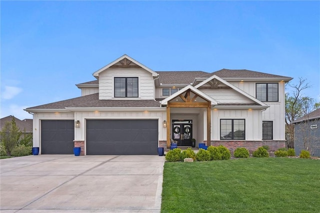 18050 N Peach Blossom Dr, Platte City, MO 64079 - view of front facade featuring board and batten siding, a front lawn, driveway, a shingled roof, and an attached garage