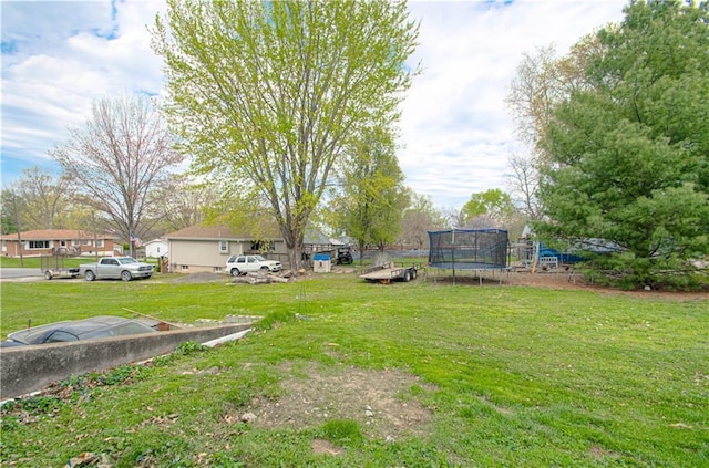 view of yard featuring a trampoline
