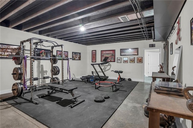 workout area with visible vents and baseboards