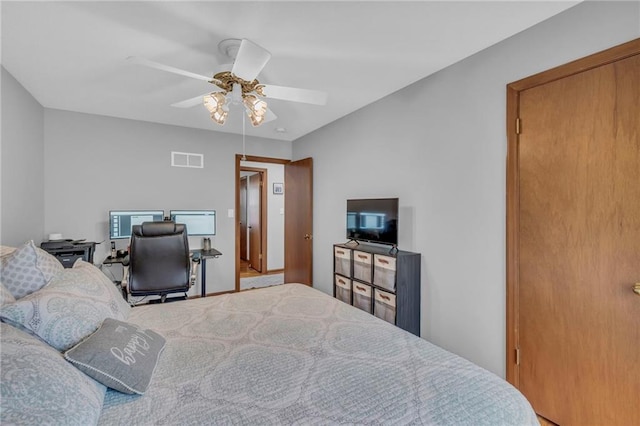 bedroom featuring visible vents and a ceiling fan