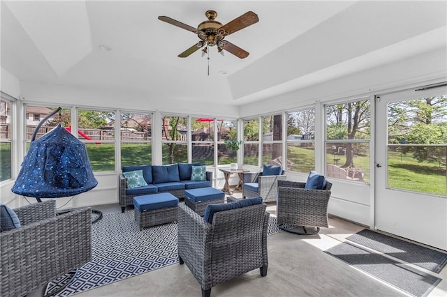 sunroom with an outdoor hangout area, a ceiling fan, and a wealth of natural light