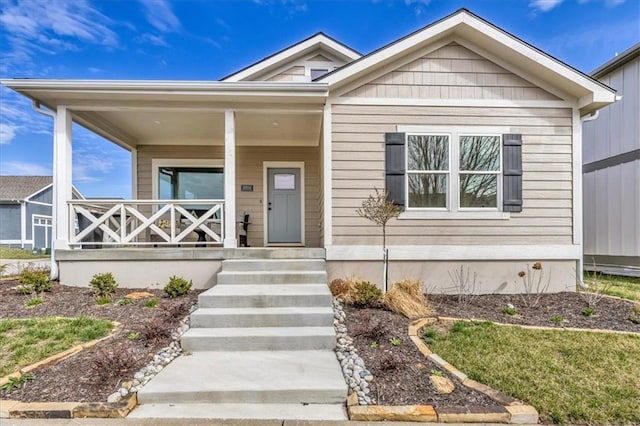 8804 NE 81st Ter, Kansas City, MO 64158 - view of front of house with covered porch