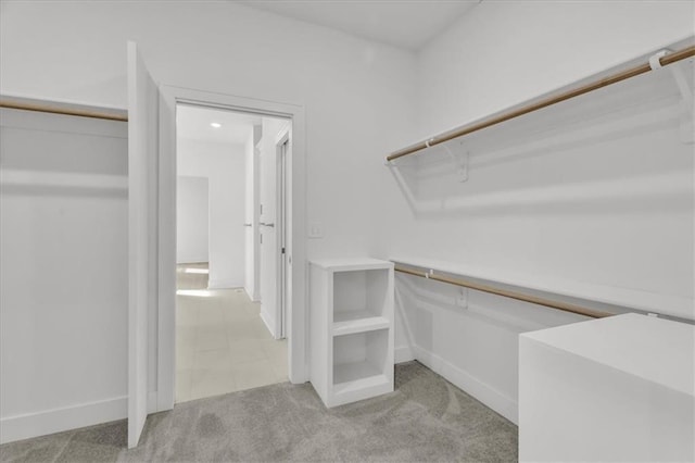 8804 NE 81st Ter, Kansas City, MO 64158 - spacious closet with light carpet