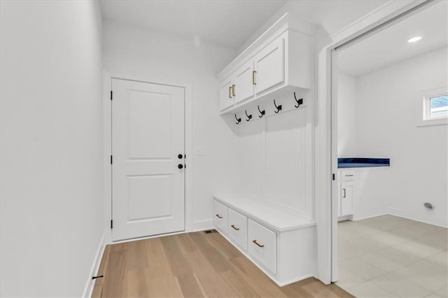 8804 NE 81st Ter, Kansas City, MO 64158 - mudroom featuring baseboards, light wood finished floors, and recessed lighting