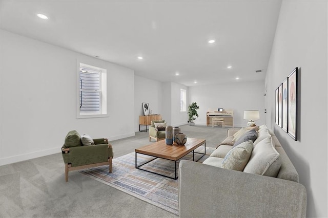 8804 NE 81st Ter, Kansas City, MO 64158 - living room with carpet floors, baseboards, and recessed lighting