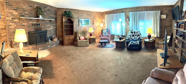 220 W John St, Milo, MO 64767 - living area with wood walls, a wood stove, and carpet
