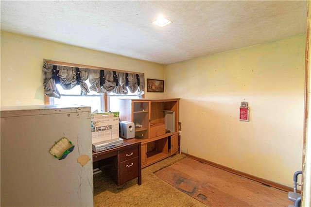 220 W John St, Milo, MO 64767 - office area featuring a textured ceiling