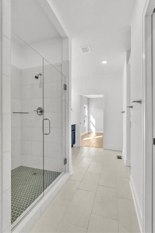 8137 N Farley Ave, Kansas City, MO 64158 - full bath with tile patterned flooring, baseboards, and a shower stall