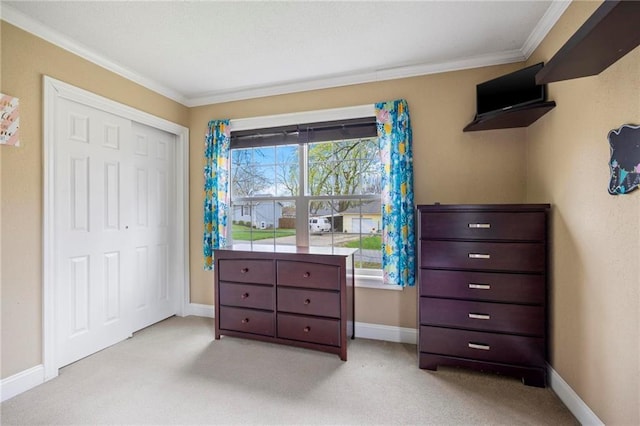 508 S 7th St, Louisburg, KS 66053 - bedroom with ornamental molding, light colored carpet, baseboards, and a closet