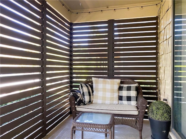 balcony featuring outdoor dining space and a patio area