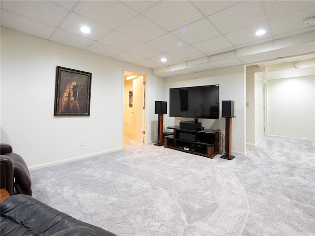 carpeted living area with recessed lighting, a paneled ceiling, and baseboards
